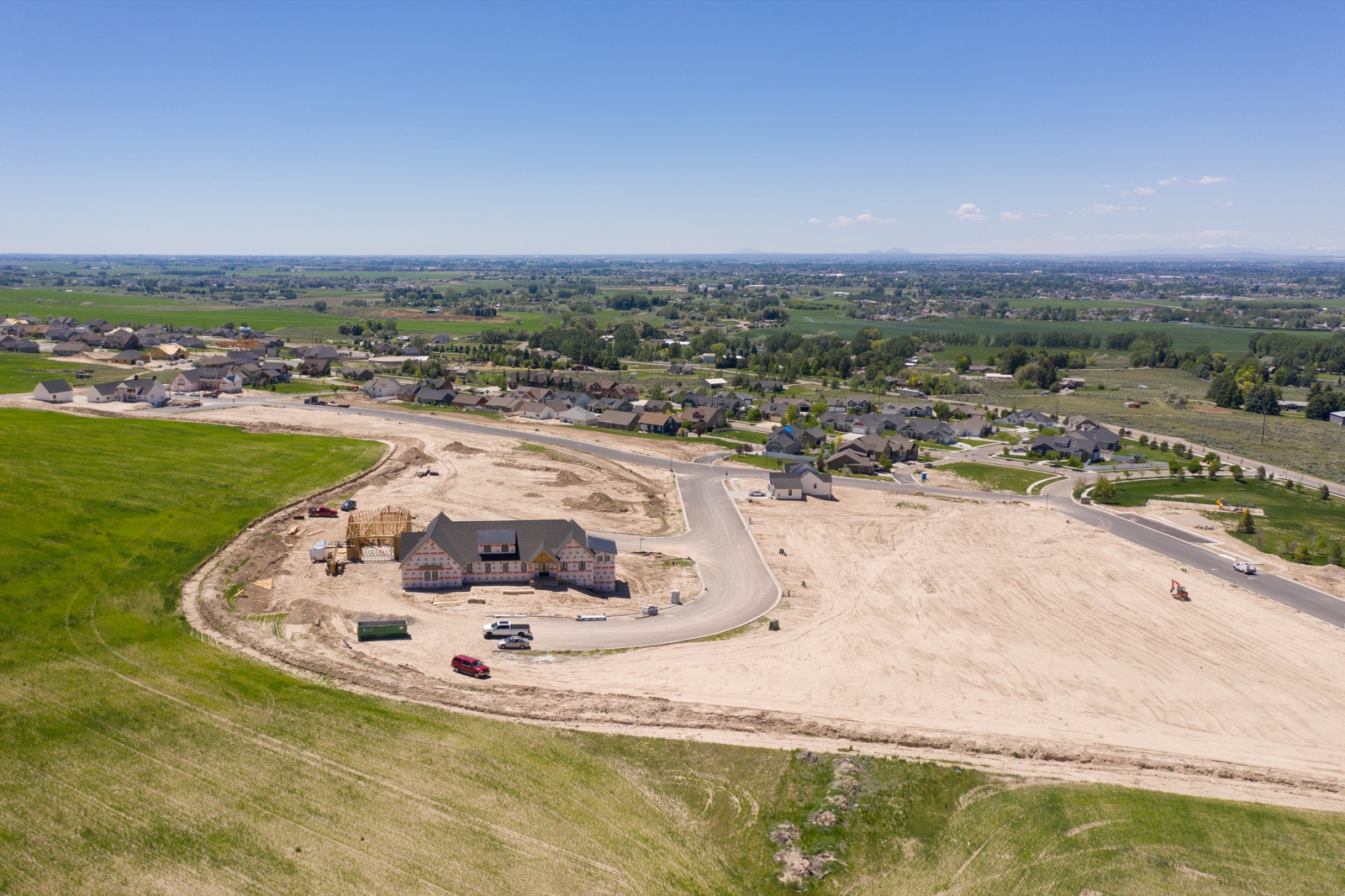 Aerial view of Hawks Landing on the foothills with the Idaho Falls valley stretching to the horizon