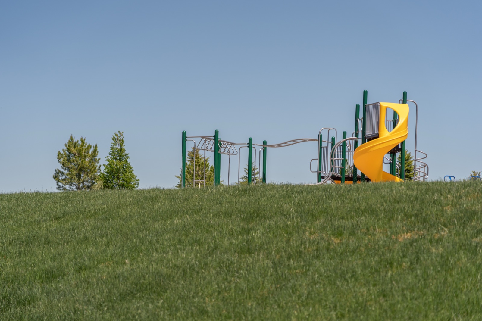 Community park playground at Hawks Landing on a sunny day